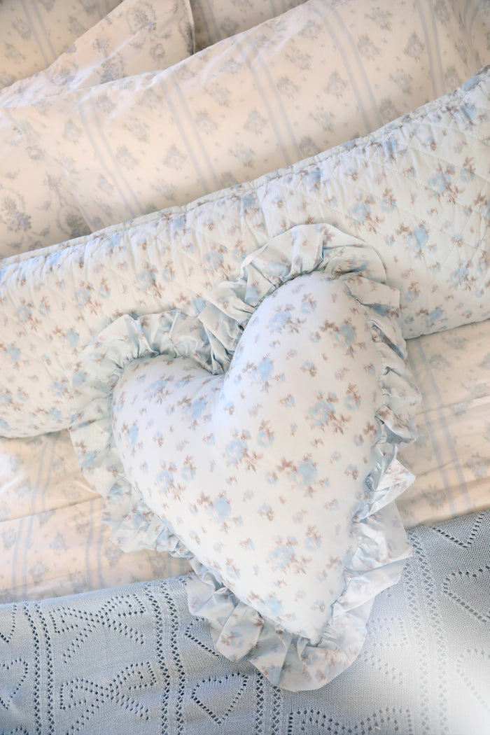 Blue, 100% cotton chic throw blanket. Featuring heart and bow-stripped pointelle details.