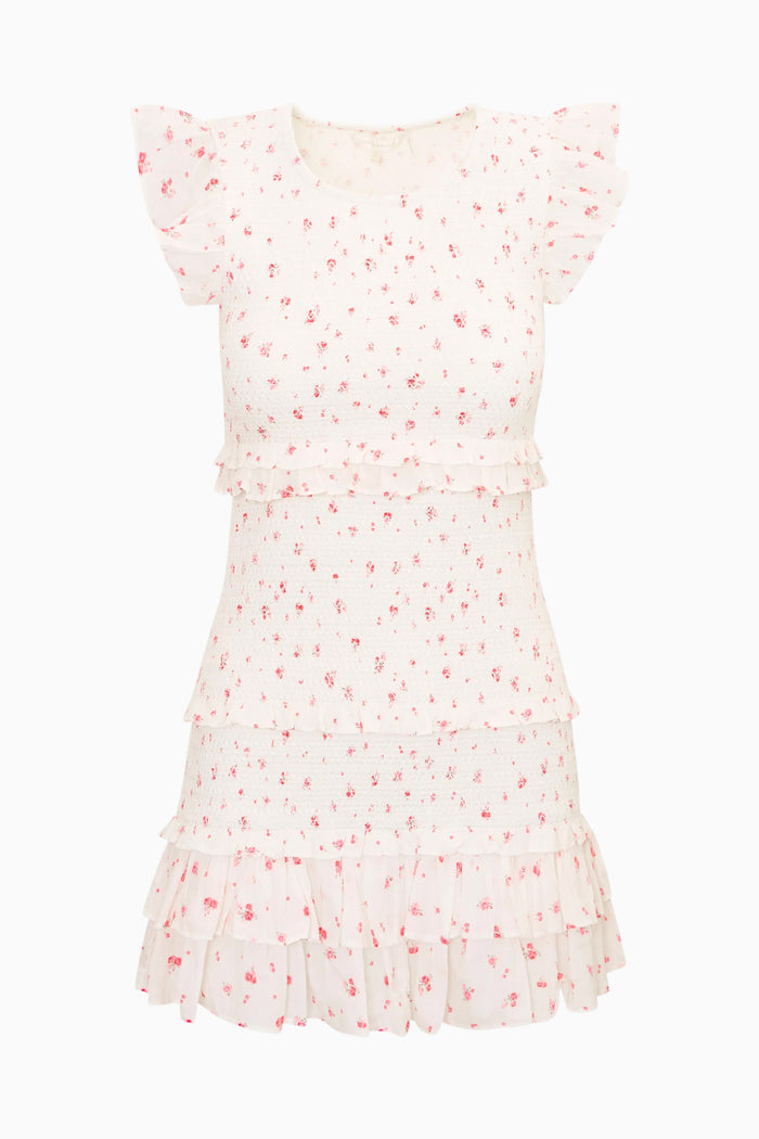 White dress with red floral pattern on a white background
