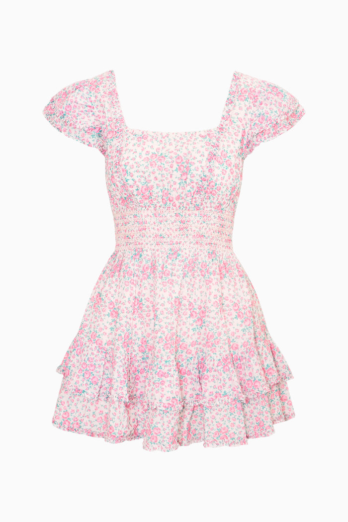 Floral dress with ruffled skirt on a white background