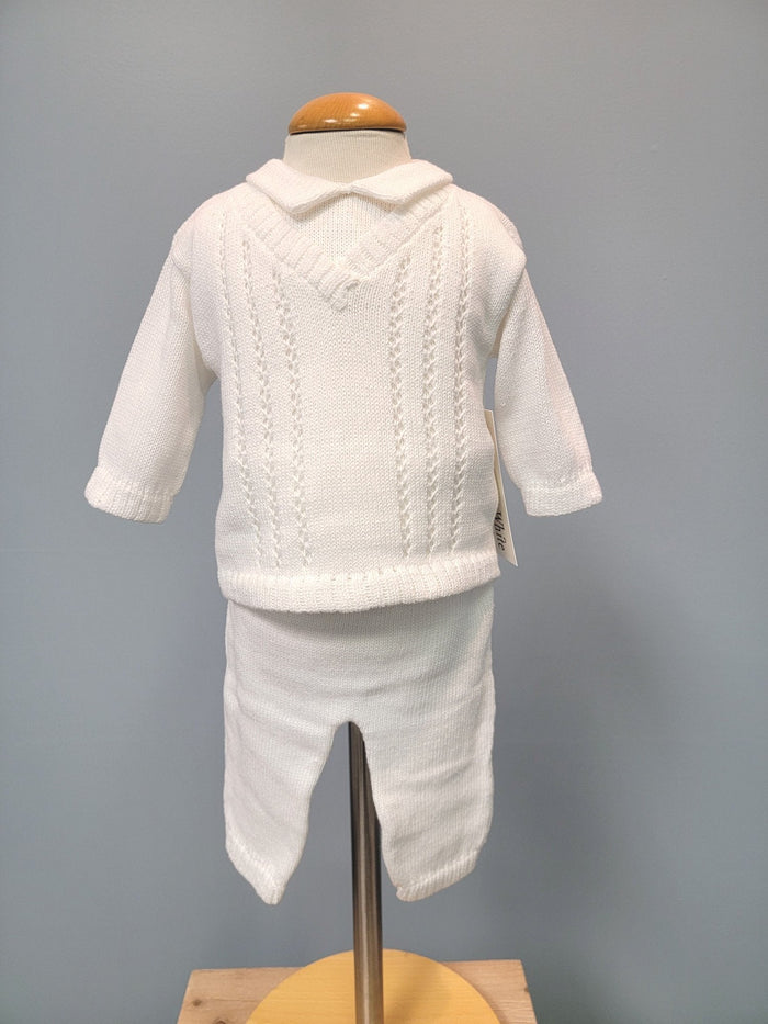 White knit baby boy outfit with long pants.