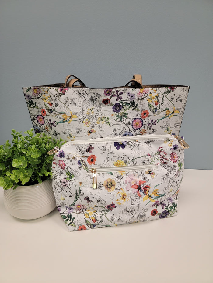 Reversible tote with included pouch.