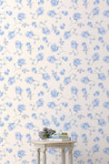 Introducing a delicate blue rose print wallpaper featuring a soft antique white background. This wallpaper exudes elegance with its large, intricately detailed roses.