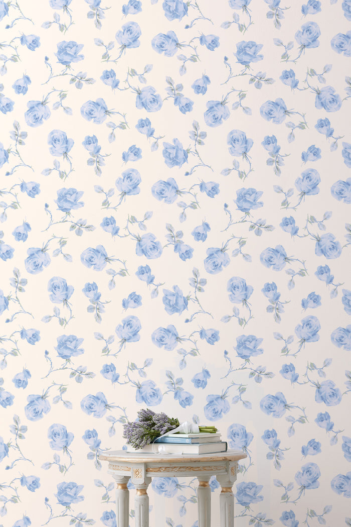 Introducing a delicate blue rose print wallpaper featuring a soft antique white background. This wallpaper exudes elegance with its large, intricately detailed roses.