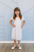 girl in white lace dress