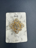 Small Gold and Rhinestone Brooch