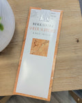 Knee high stockings in package.