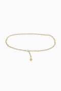 Gold chain belt with a small heart charm on a white background