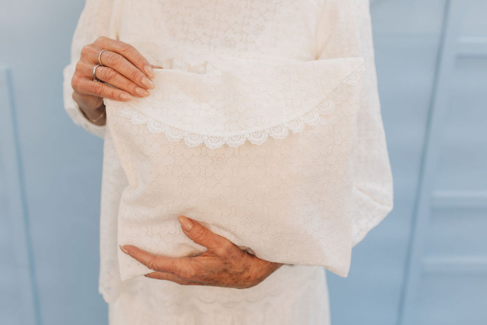 Lace envelope with scalloped flap.