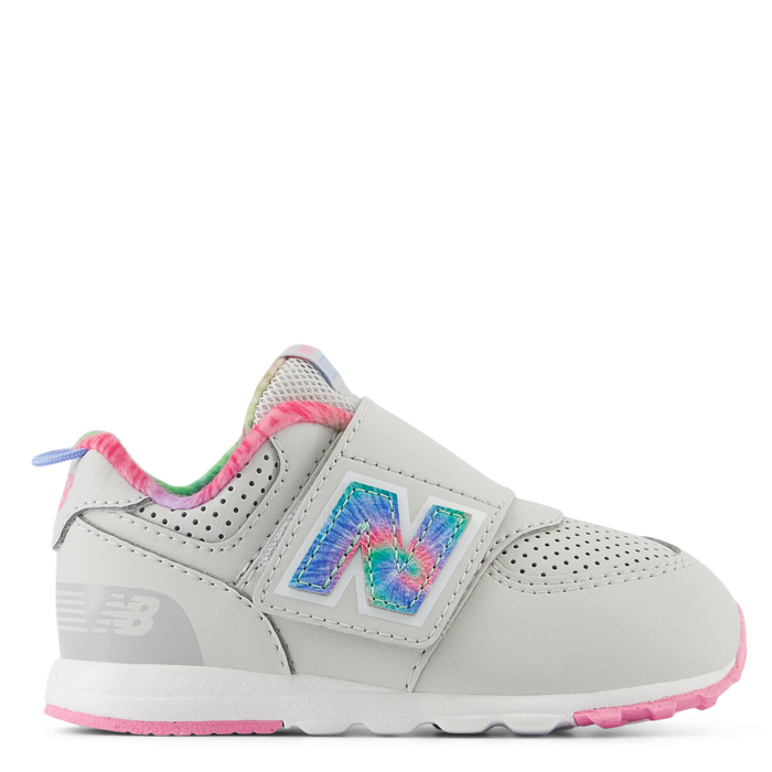 Gray sneaker with pink and blue accents on a white background