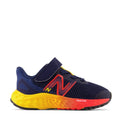A toddler's sneaker with black and blue color scheme, featuring a New Balance logo, and a bungee lace with top strap.