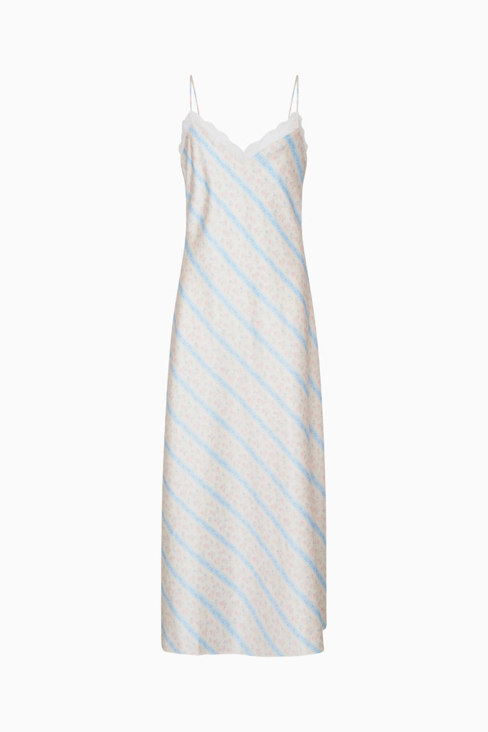 Striped slip dress with thin straps on a white background