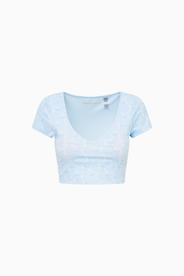 Light blue crop top on a white background