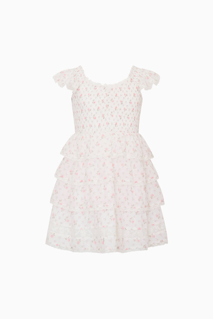 Beige ruffle dress with pink floral pattern on a white background