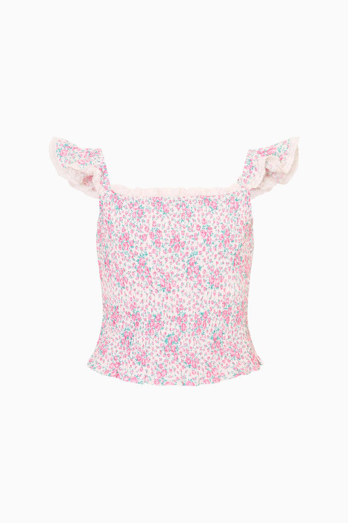 Floral-patterned top with ruffled shoulders on a white background