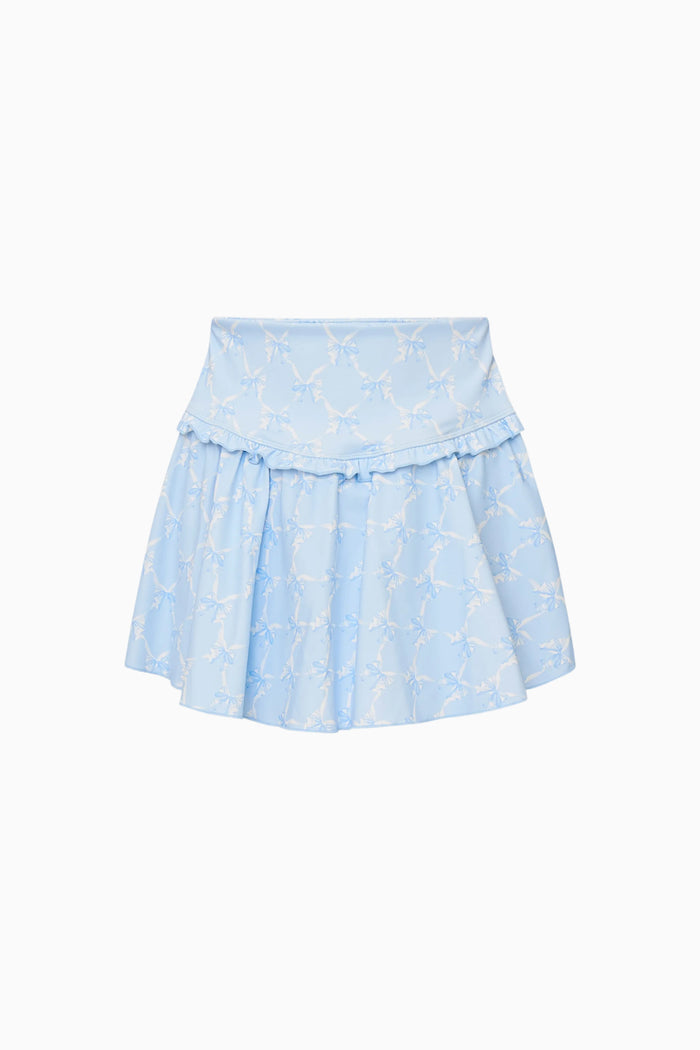 Light blue skirt with bow pattern on a white background