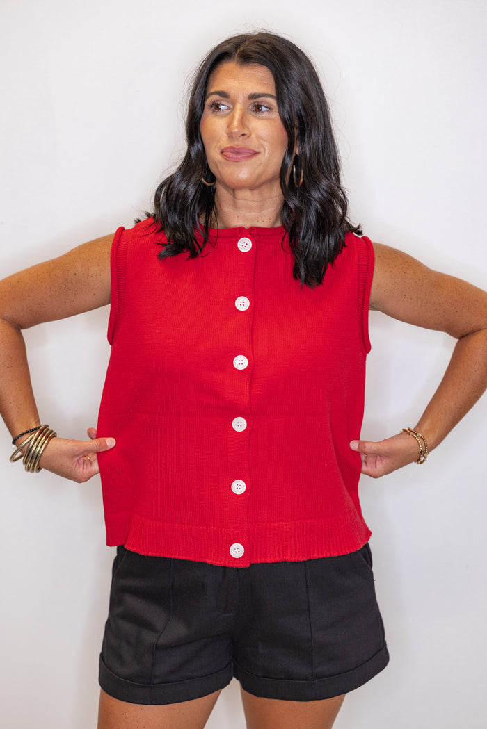 Red knit button front sleeveless sweater vest by Wishlist showing relaxed silouhette