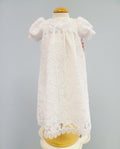 White lace baby gown with bow.