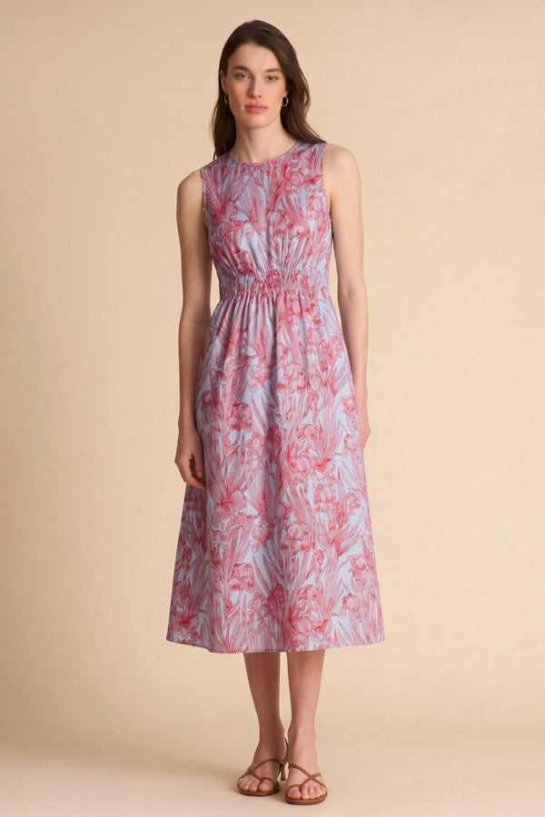 Woman wearing a sleeveless floral dress on a beige background | Exclude | Grid