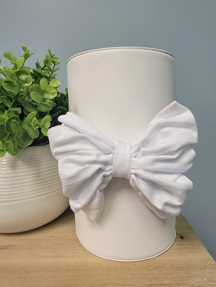 Fabric bow headband for babies.