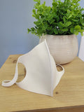 Plain white polyester face mask.