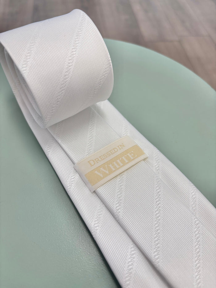 White striped tie with logo on back.