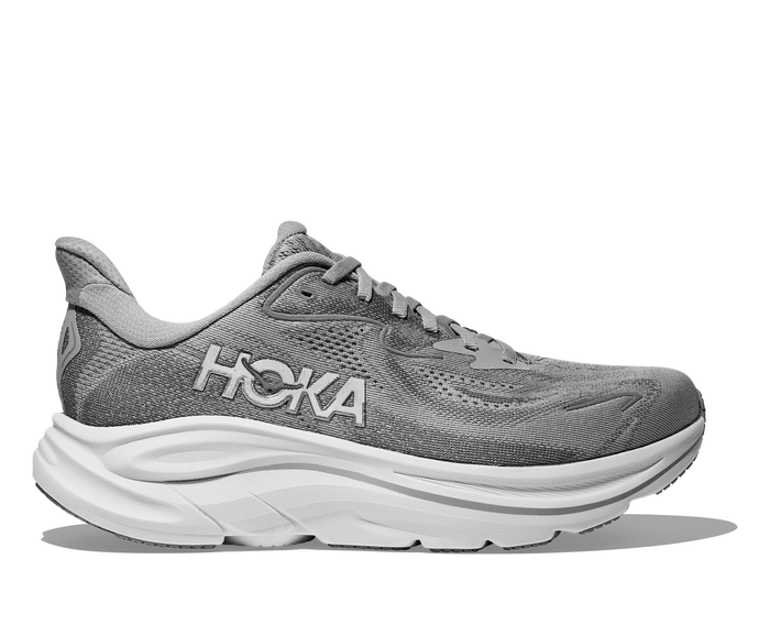 Gray running shoe with white sole on a white background