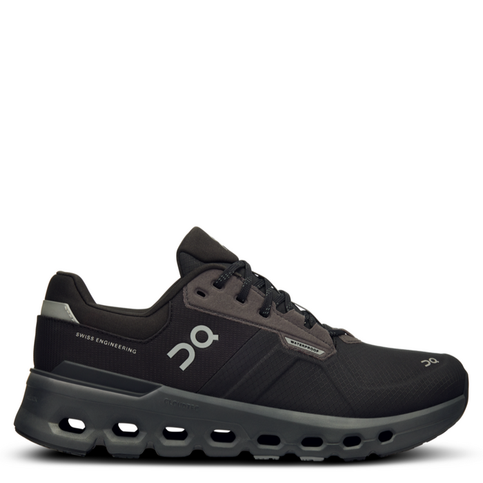 A pair of women's waterproof running shoes with a black upper and a black sole.