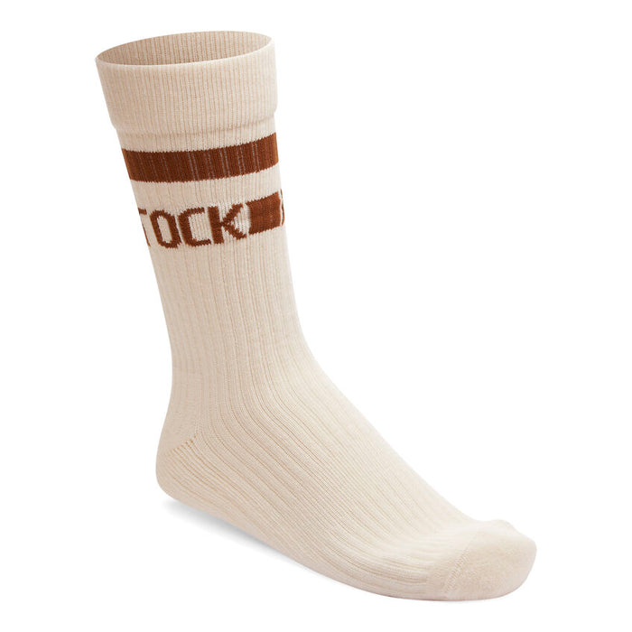 A pair of women's organic cotton crew socks with brown stripes and the BIRKENSTOCK logo on the ankle.