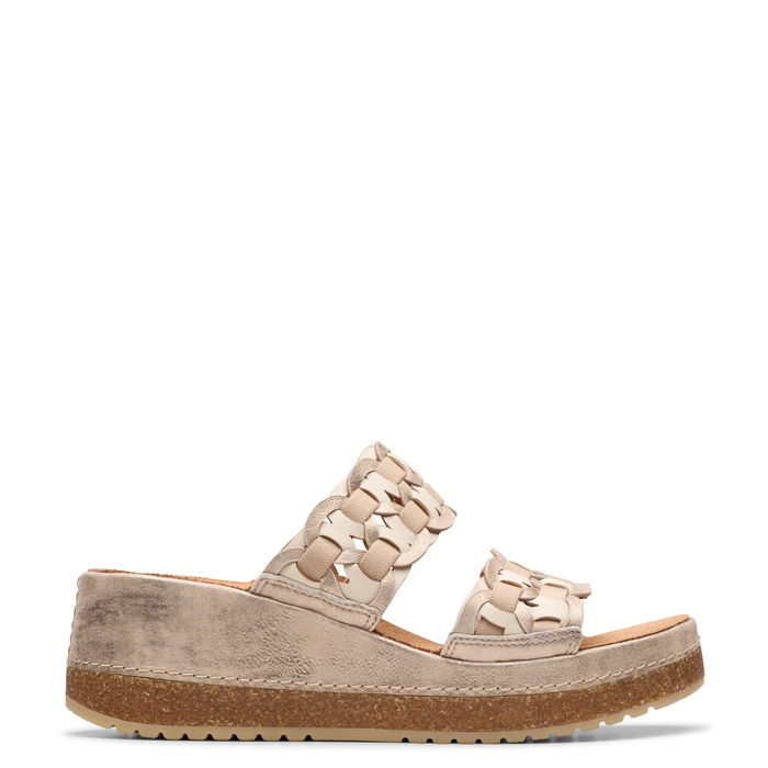 A woman's mule sandal with a metallic leather upper, adjustable ankle strap, and a flat wedge sole.
