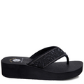 A black women's wedge sandal with a round toe and embellished straps, from the Mellow Mat collection.