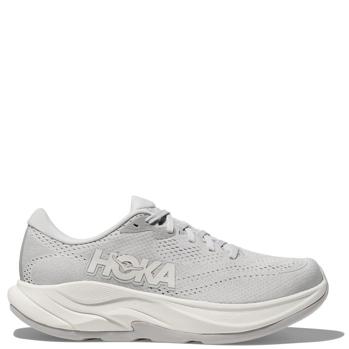A pair of grey Hoka Rincon 4 running shoes with a white sole and lace-up closure.